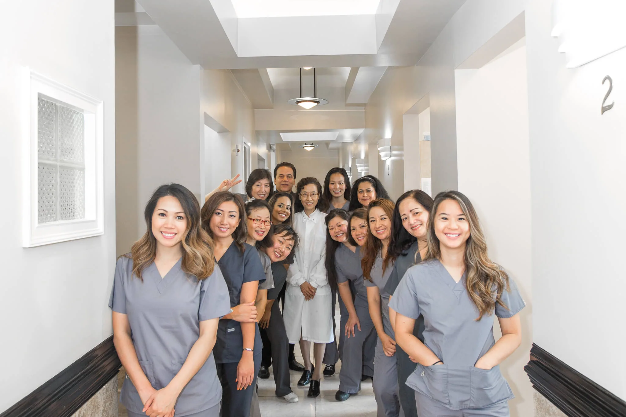 Bright, modern dental office hallway at Yi-Tsu Cheng, D.D.S. & Associates in Chamblee, GA